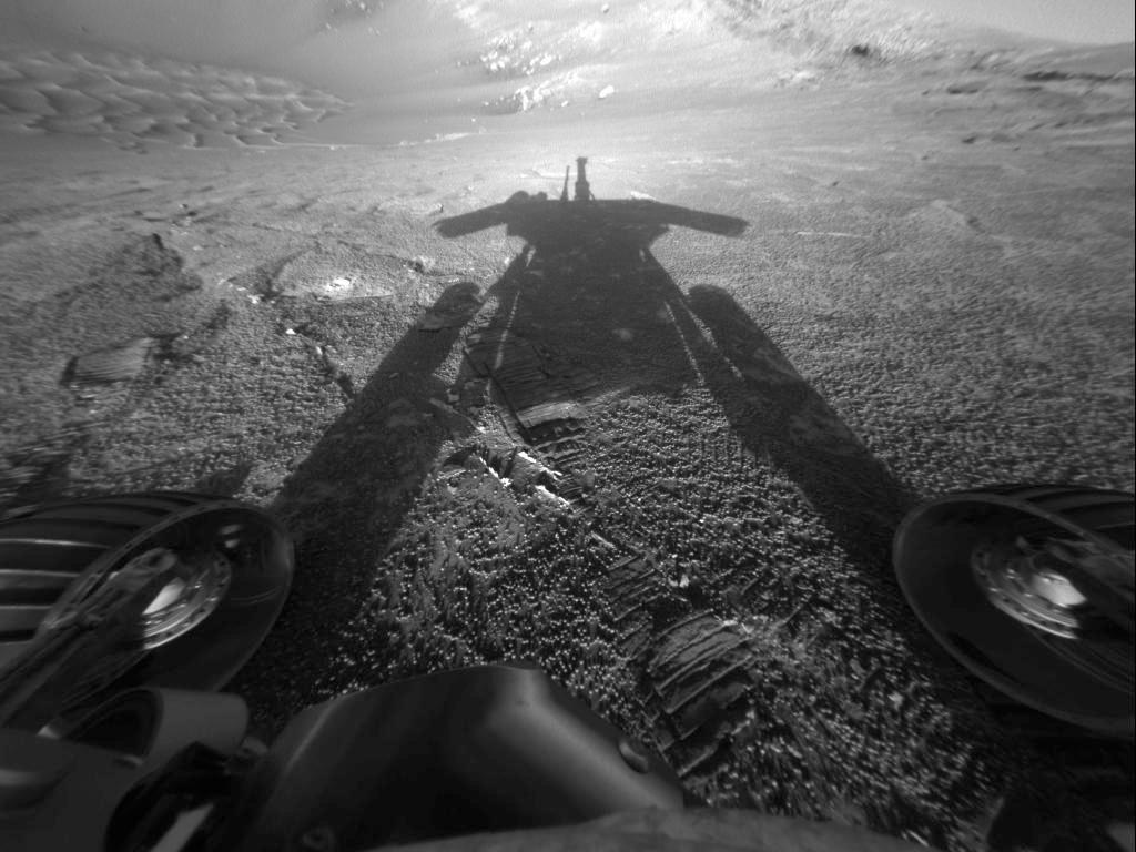 Opportunity Views Its Own Shadow: NASA’s Spirit and Opportunity Mars rovers landed on the Red Planet on Jan. 3 and 24, 2004, respectively. This image shows a view Opportunity captured of its own shadow on July 26 of that year, the 180th Martian day, or sol, of its mission. Credits: NASA/JPL-Caltech