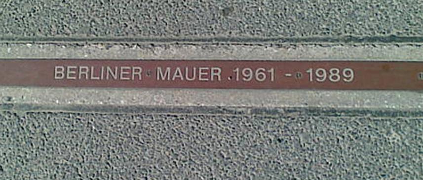 A plaque near Checkpoint Charlie signifying where the Wall stood